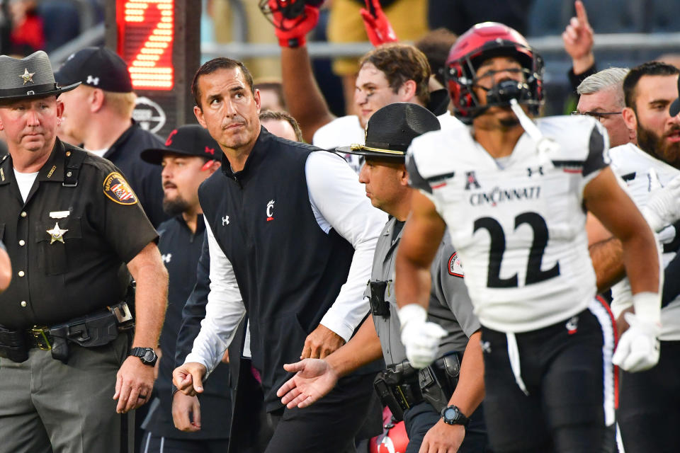 Oct 2, 2021; South Bend, Indiana, USA; Cincinnati Bearcats head coach Luke Fickell watches the clock expire as Cincinnati defeated the Notre Dame Fighting Irish at Notre Dame Stadium. Mandatory Credit: Matt Cashore-USA TODAY Sports