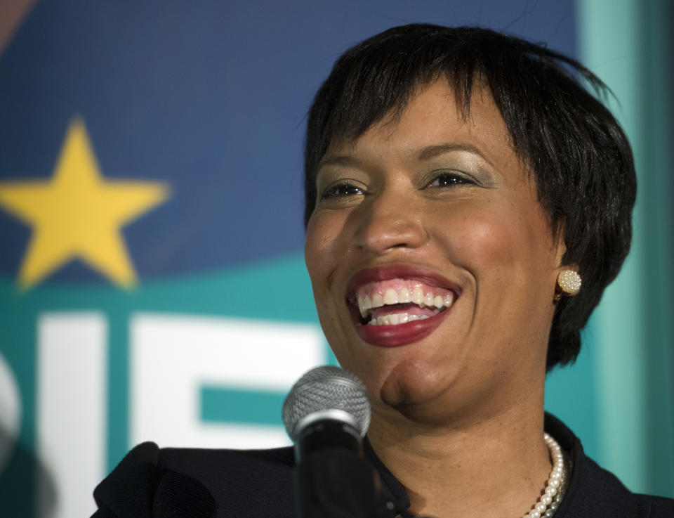 D.C. Mayoral candidate, and Council Member Muriel Bowser addresses her supporters at her election night watch party to await the Democrate Primary results in Washington, Tuesday, April 1, 2014. (AP Photo/Cliff Owen)