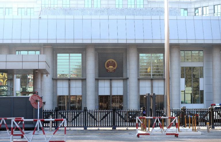 Barricades are set up outside the No. 1 Intermediate court in Beijing on January 22, 2014