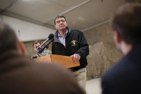 U.S. Secretary of Defense Ash Carter holds a news conference after spending the day at Kandahar Airfield February 22, 2015. REUTERS/Jonathan Ernst