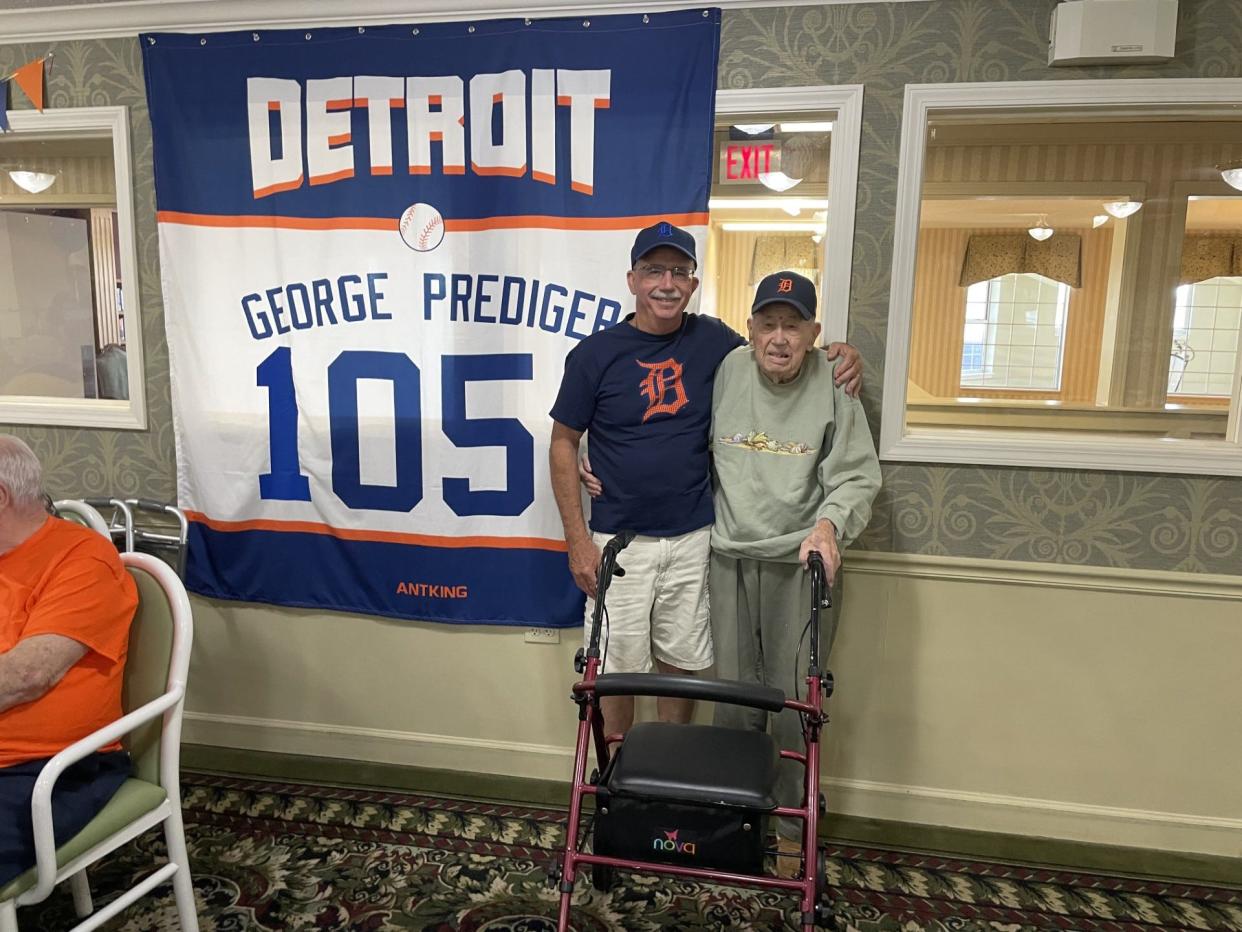 During his birthday party, George Prediger took photos next to a Detroit Tigers-themed banner with his name and age on it.