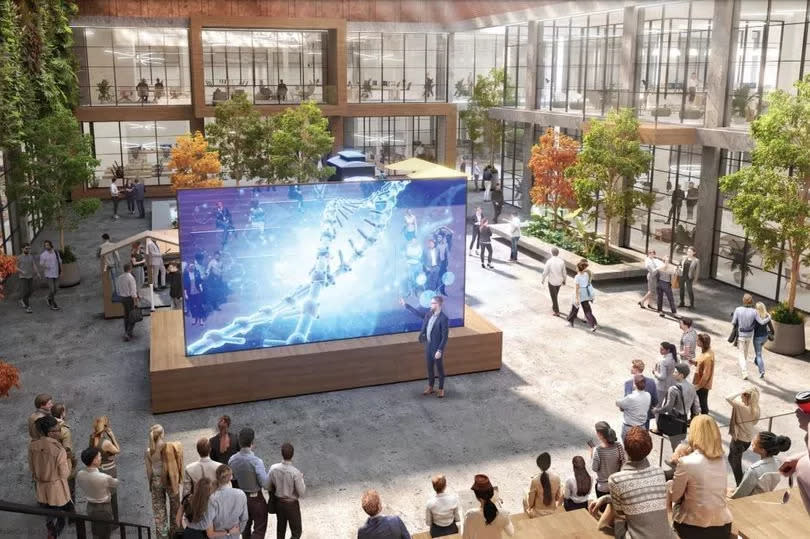 CGI showing atrium with man presenting at a screen and people sitting on steps watching.