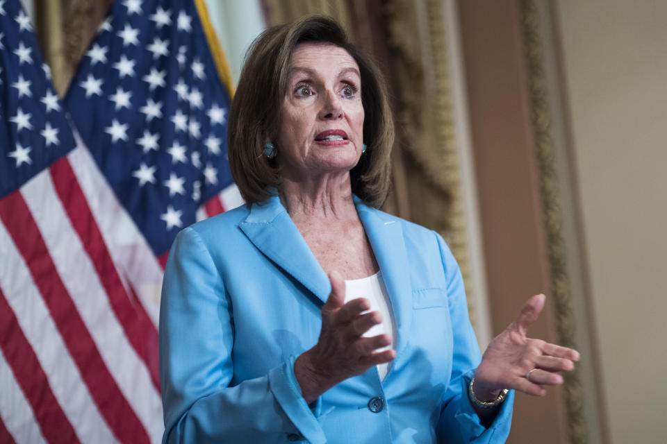 UNITED STATES - AUGUST 1: Speaker Nancy Pelosi, D-Calif., conducts as a bill signing ceremony in the Capitol with Senate Minority Leader Charles Schumer, D-N.Y., for the Bipartisan Budget Act of 2019 on August 1, 2019. (Photo By Tom Williams/CQ Roll Call)