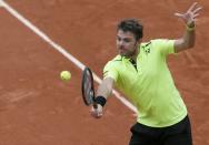 Switzerland's Stan Wawrinka returns the ball. French Open - Roland Garros - Switzerland's Stan Wawrinka vs Czech Republic's Lukas Rosol Paris, France - 23/05/16. REUTERS/Gonzalo Fuentes