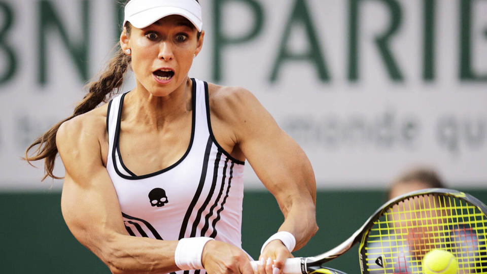Vitalia Diatchenko and her huge biceps in action. (Photo by THOMAS SAMSON/AFP/Getty Images)