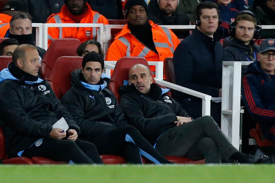 Manchester City's Spanish manager Pep Guardiola and his assistant Mikel Arteta. (Credit: Getty Images)