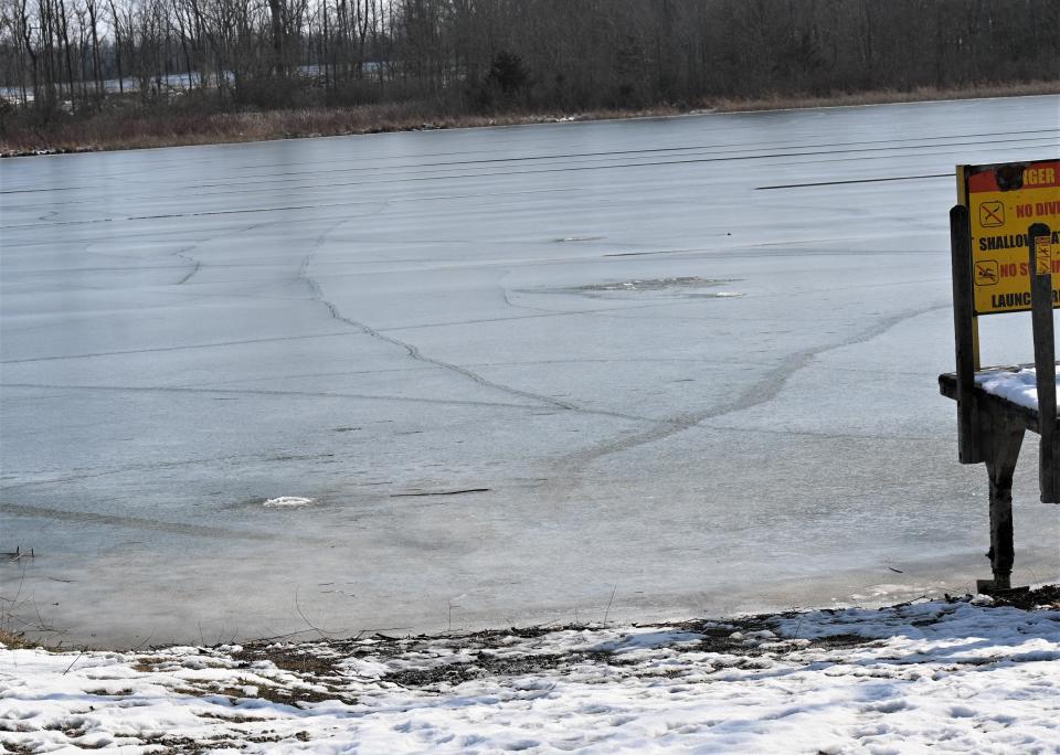 Less than 24 hours after an ice fisherman sat out on Cary Lake there was open water and cracks in the thin ice.