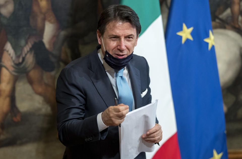 Italian Premier Giuseppe Conte arrives to give a press conference on measures to relaunch the economy following the coronavirus outbreak, at Palazzo Chigi premier's office, in Rome, Tuesday, July 7, 2020. (Roberto Monaldo/LaPresse via AP)