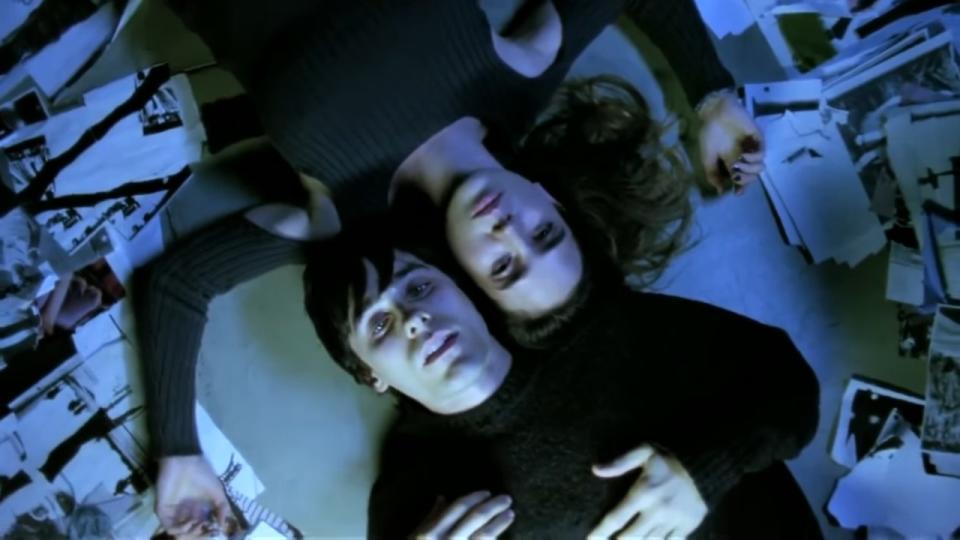 Harry (Jared Leto) & Marion (Jennifer Connelly) lie backwards on the floor with their heads touching