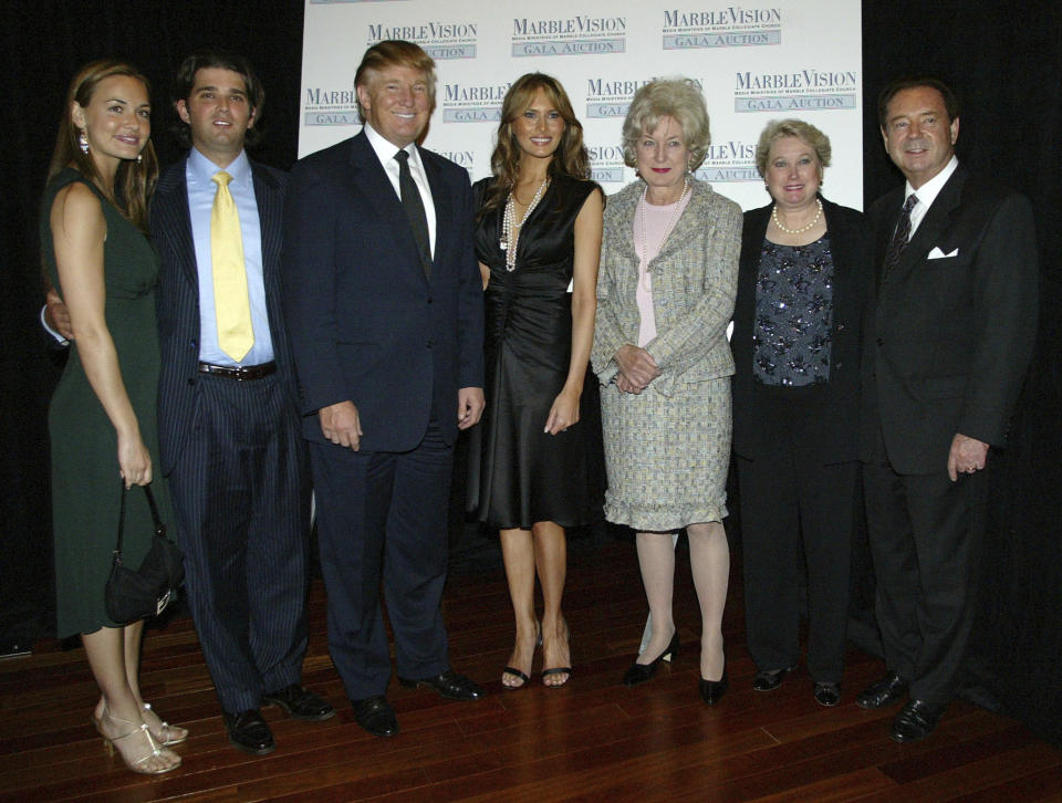 FILE - Members of the Trump family pose for pictures during the Marble Collegiate Church 2005 Gala Auction and Award ceremony, Wednesday, April 20, 2005, in New York. Vanessa Haydon, from left, Donald Trump Jr., Donald Trump, wife Melania Trump, Judge Maryanne Trump Barry, Elizabeth Trump Grau and husband James Grau. Barry, a former federal judge in New Jersey and Donald Trump's older sister, has died at the age of 86. (AP Photo/Jason Szenes, File)