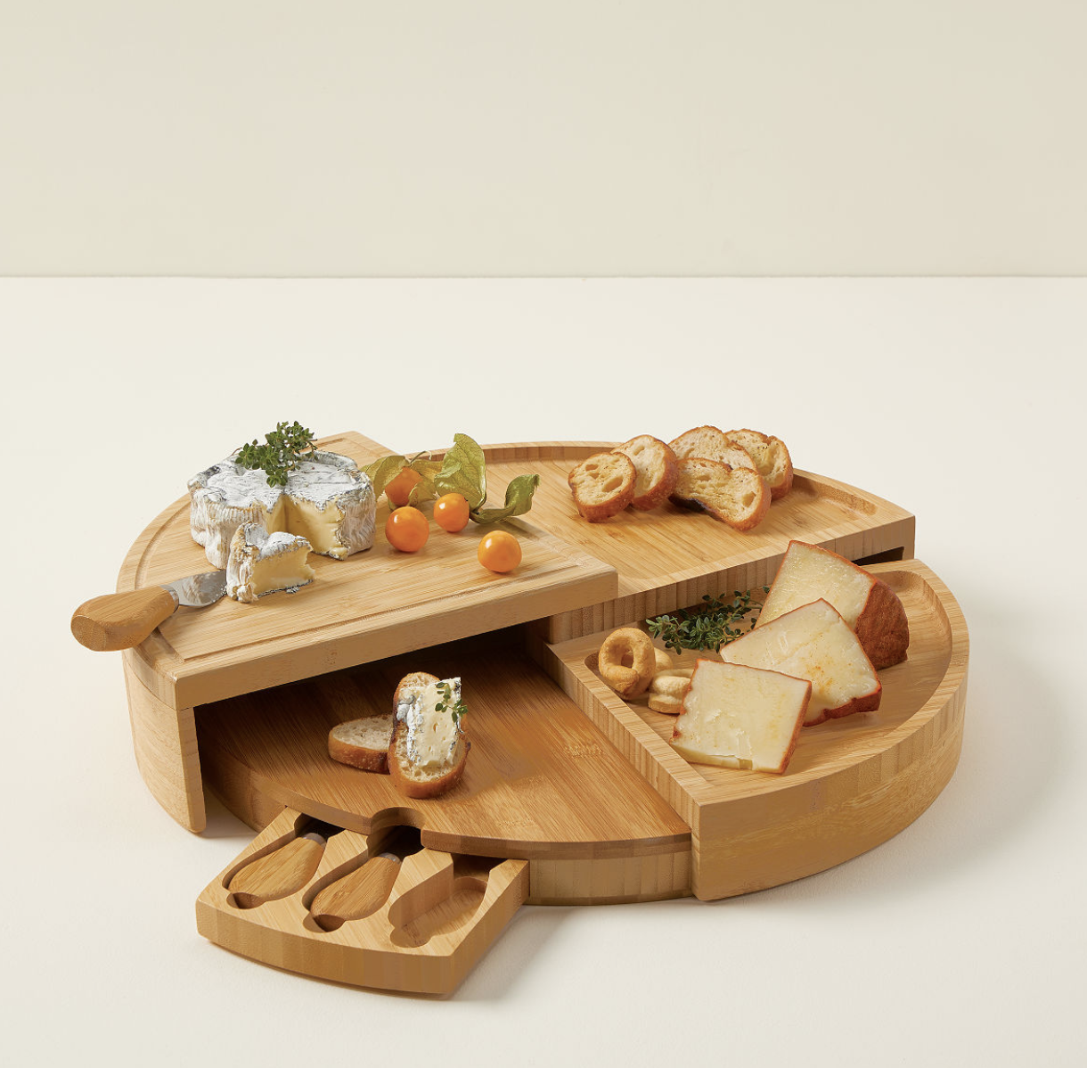 <p><a href="https://go.redirectingat.com?id=74968X1596630&url=https%3A%2F%2Fwww.uncommongoods.com%2Fproduct%2Fcompact-swivel-cheese-board-with-knives&sref=https%3A%2F%2Fwww.countryliving.com%2Fshopping%2Fgifts%2Fg39862858%2Fgifts-for-mom-from-son%2F" rel="nofollow noopener" target="_blank" data-ylk="slk:Shop Now;elm:context_link;itc:0;sec:content-canvas" class="link rapid-noclick-resp">Shop Now</a></p><p>Compact Swivel Cheese Board with Knives</p><p>uncommongoods.com</p><p>$53.00</p><span class="copyright">Uncommon Goods</span>