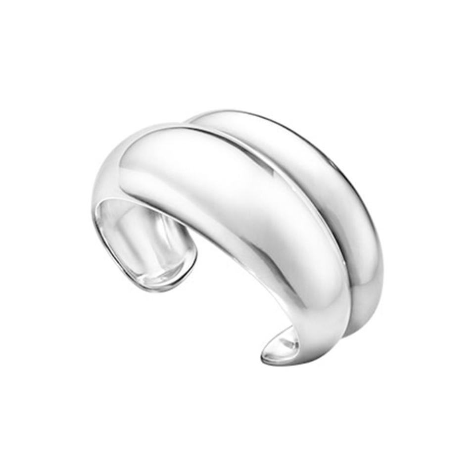 <p><a href="https://www.scullyandscully.com/georg-jensen-silver-curved-bangles?quantity=1&style3=1505&gad_source=1&gclid=CjwKCAiApuCrBhAuEiwA8VJ6JpwBDp8hqBnR6MEvkRTq-HqBg9gHulxGpee13GvivaG0vbsWbu5qLBoCw70QAvD_BwE" rel="nofollow noopener" target="_blank" data-ylk="slk:Shop Now;elm:context_link;itc:0;sec:content-canvas" class="link ">Shop Now</a></p><p>Silver Curved Bangle</p><p>scullyandscully.com</p><p>$795.00</p>