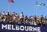 Spectators watch the Australian Formula One Grand Prix in Melbourne, Australia, Sunday, April 10, 2022. (AP Photo/Asanka Brendon Ratnayake)