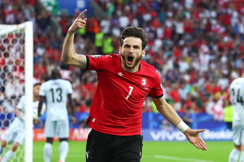 Khvicha Kvaratskhelia of Georgia celebrates scoring against Portugal at Euro 2024