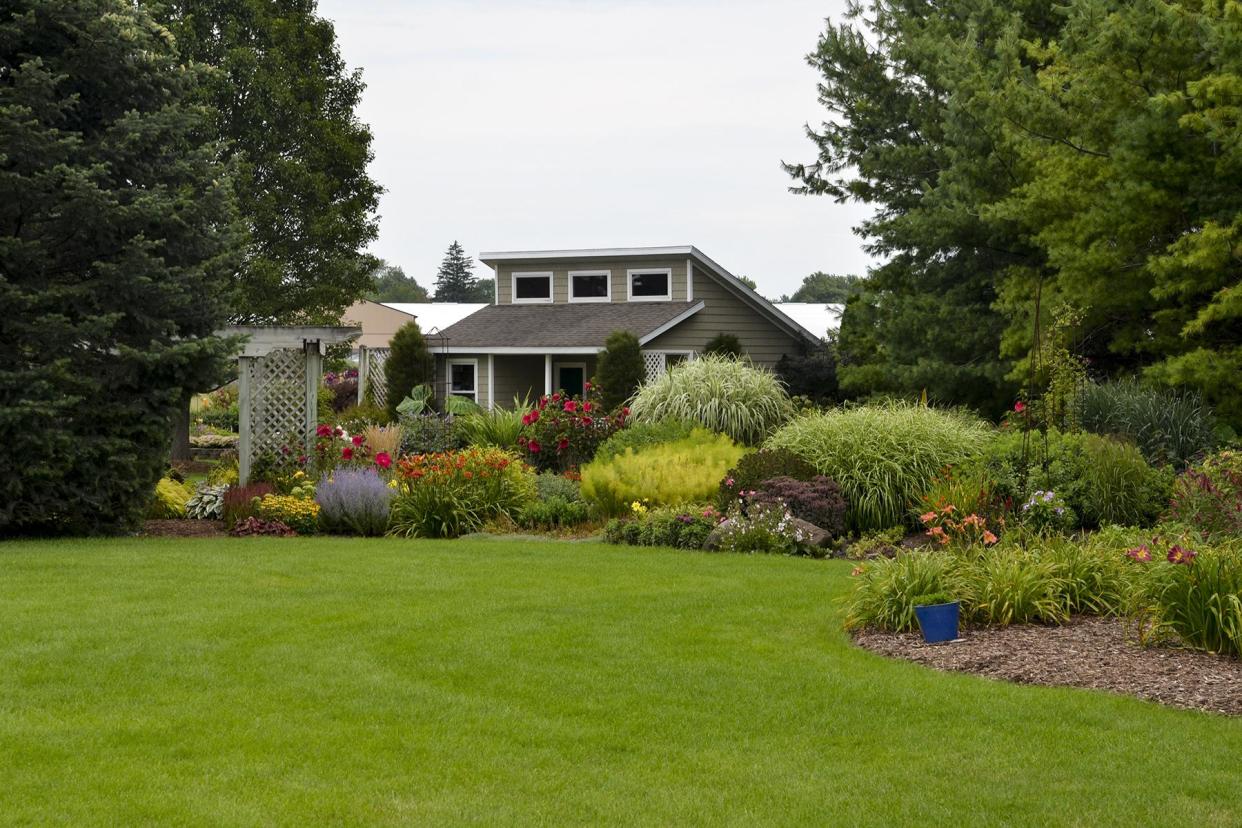 A high-quality lawn adds to the curb appeal and value of a home.