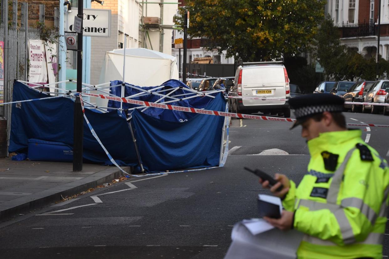 Police at the scene of a murder in Parsons Green in October last year, as a charity has launched a project to do more along 'county lines' drug wars: Jeremy Selwyn