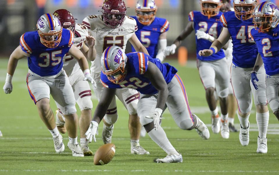 Bolles Bulldogs' Garrison Butler (52) scrambles to pick up a fumble by Episcopal Eagles's Nate Blair (11) during second quarter action. The Episcopal Eagles were hosted by The Bolles School Bulldogs at Skinner-Barco Stadium in the FHSAA Region 1-2M high school football quarterfinal game Friday, November 11, 2022. Bolles went into half time with a 28 to 0 lead. [Bob Self/Florida Times-Union]