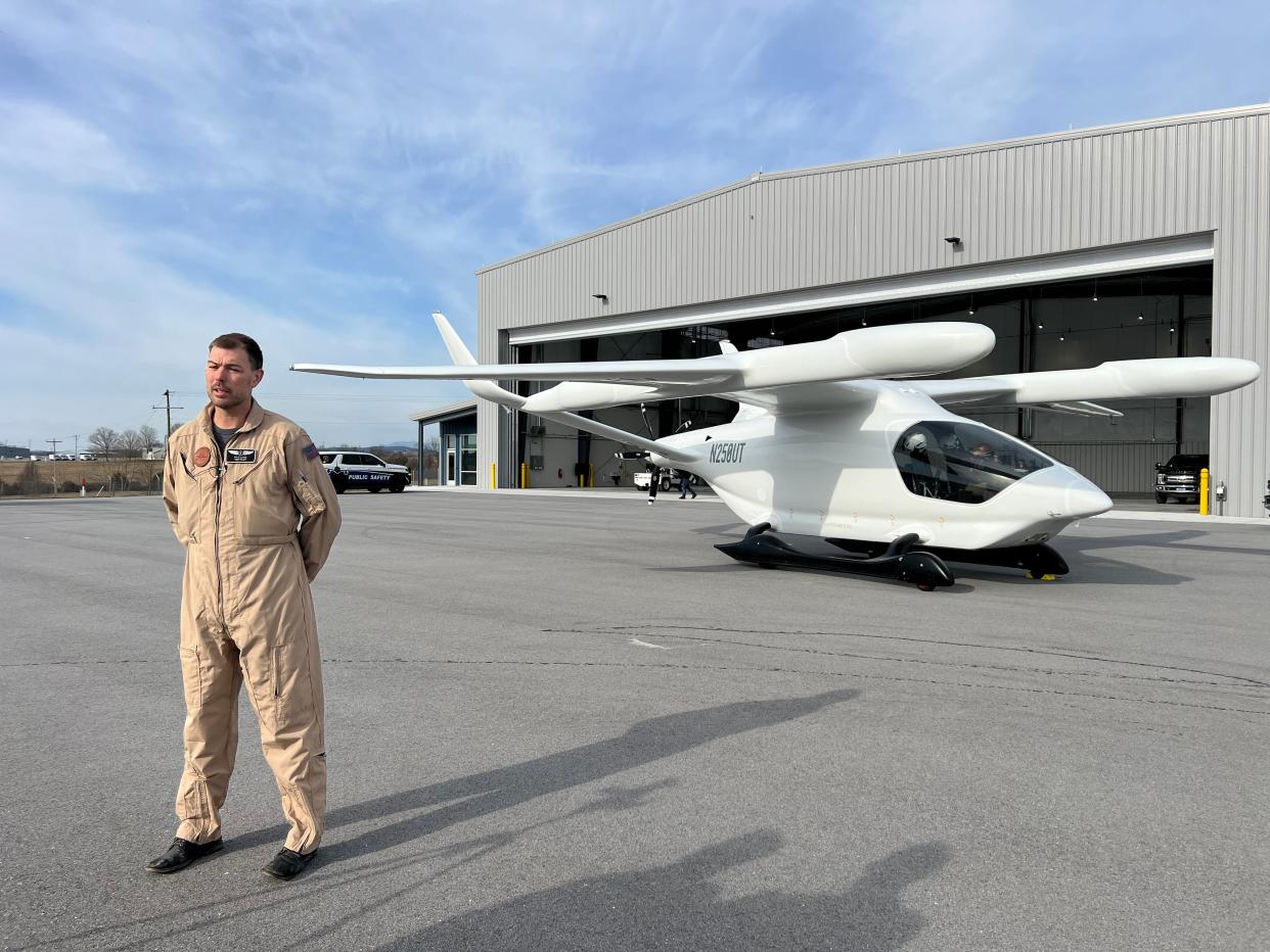 BETA CEO & Founder Kyle Clark with BETA Alia all-electric aircraft