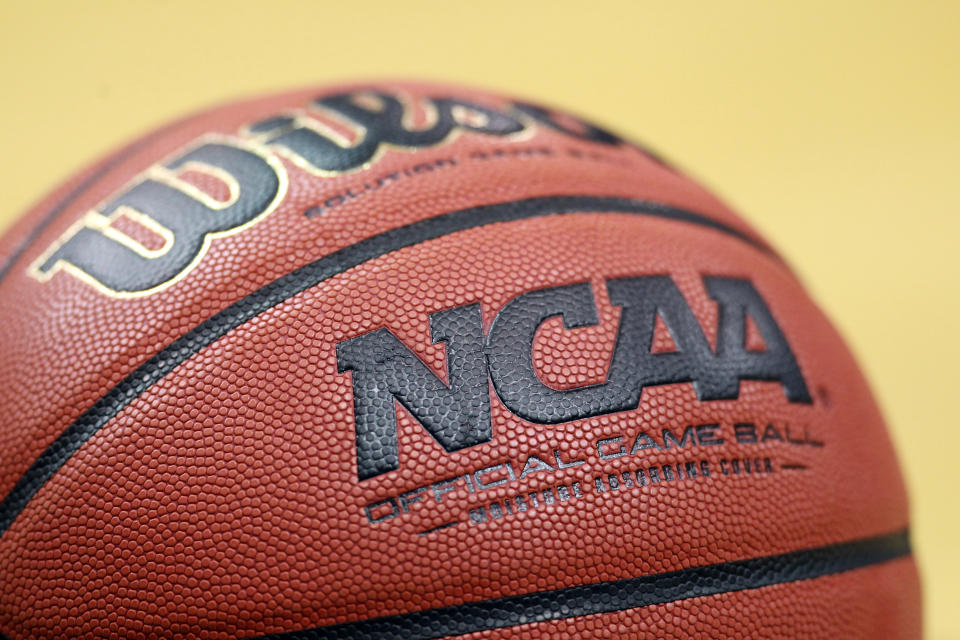 A detail of an official NCAA Men's Basketball game ball made by Wilson is seen on the court as the Iowa State Cyclones play against the Connecticut Huskies during the second round of the 2012 NCAA Men's Basketball Tournament at KFC YUM! Center on March 15, 2012 in Louisville, Kentucky.  (Photo by Andy Lyons/Getty Images)