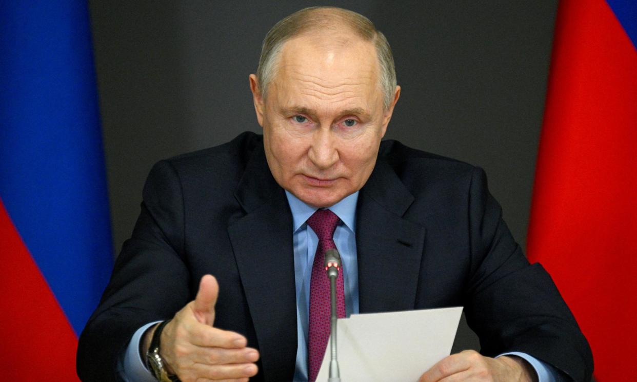 <span>Vladimir Putin chairs a meeting on investment projects in domestic industry in Chelyabinsk, Russia, on Friday.</span><span>Photograph: Sputnik/Reuters</span>