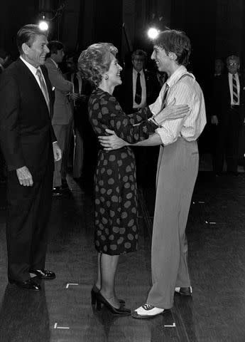 <p>Guy DeLort/WWD/Penske Media via Getty</p> Ronald Reagan and Nancy Reagan in 1981