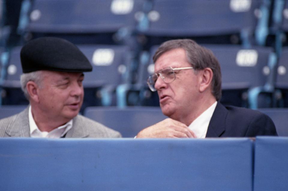 Green Bay Packers general manager Ron Wolf, right, chats with Milwaukee Sentinel columnist Bud Lea before the game against the Atlanta Falcons at Atlanta Fulton County Stadium in Atlanta on Dec. 1, 1991. The Packers lost 35-31.