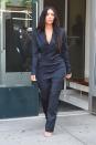 <p>On her way to the Forbes Women's Summit in New York wearing a vintage Jean Paul Gaultier suit. </p>