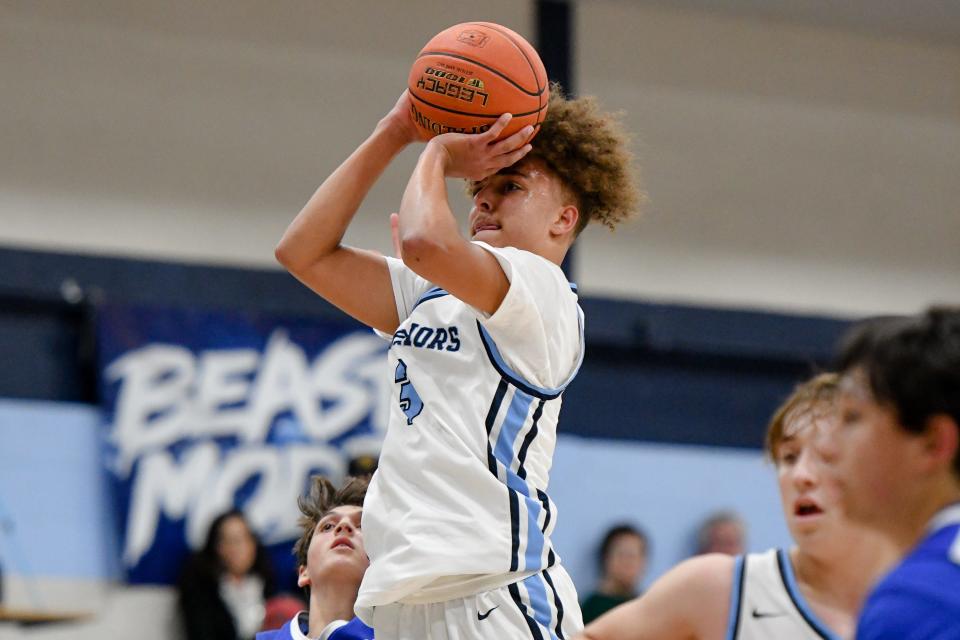 Central Valley's Isaiah Jeter shoots during Tuesday night's game against Ellwood at Central Valley.