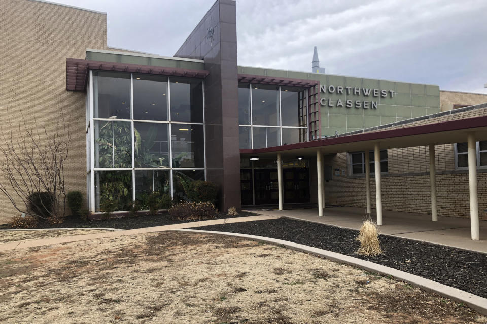 The Oklahoma City high school, Northwest Classen, where Elizabeth Warren graduated in 1964 as photographed on Tuesday, Dec. 10, 2019. The Massachusetts senator and Democratic presidential candidate has campaigned for the White House for nearly a year telling audiences nationwide that she grew up on "ragged edge of the middle class" and that her mother dramatically secured a minimum wage job at a nearby Sears at age 50 that kept the family from losing its home near the school after her father had a heart attack. But her emotional story omits some important context and nuance about her family's financial situation and her mother's employment. (AP Photo/Will Weissert)