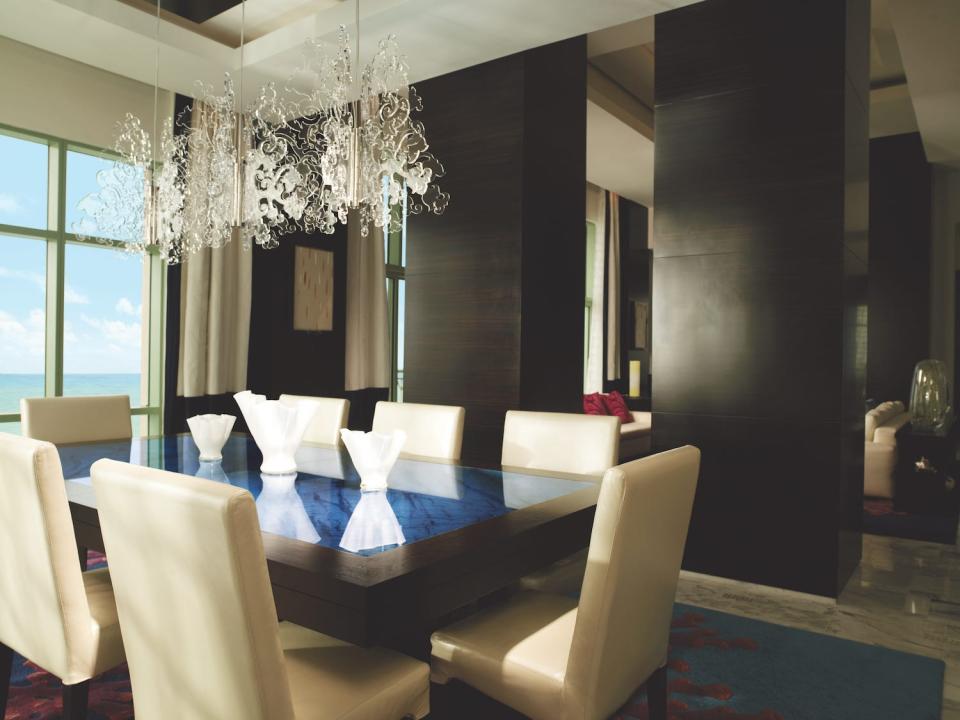 The dining room in the three-bedroom penthouse suite inside at The Cove.