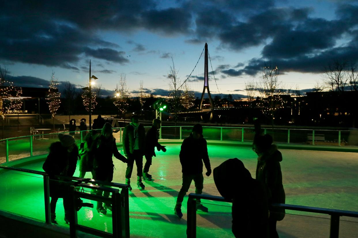 As the sun sets on a Friday evening in January, skaters work their way around the outdoor ice rink at Riverside Crossing Park in Dublin. Outdoor ice skating can be a fun and inexpensive way to celebrate Valentine's Day.