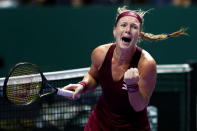 Tennis - WTA Tour Finals - Singapore Indoor Stadium, Kallang, Singapore - October 22, 2018 Kiki Bertens of the Netherlands celebrates winning her group stage match against Germany's Angelique Kerber REUTERS/Edgar Su