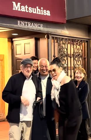 <p>The Hollywood JR / BACKGRID</p> Robert De Niro, Nobu Matsuhisa and Tiffany Chen outside Matsuhisa restaurant in Beverly Hills
