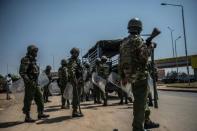 Tear gas and street battles as vote tensions roil Kenya