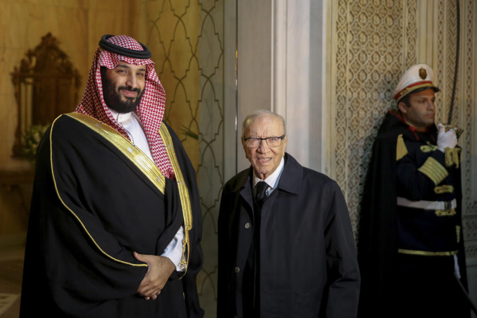 Tunisian President Beji Caid Essebsi, right, greets Saudi Crown Prince Mohammed bin Salman upon his arrival at the presidential palace in Carthage near Tunis, Tunisia, Tuesday, Nov. 27, 2018. Traveling abroad for the first time since the killing of Saudi journalist Jamal Khashoggi, the crown prince is visiting allies in the Middle East before heading to a G20 summit in Argentina later this week.(AP Photo/Hassene Dridi)