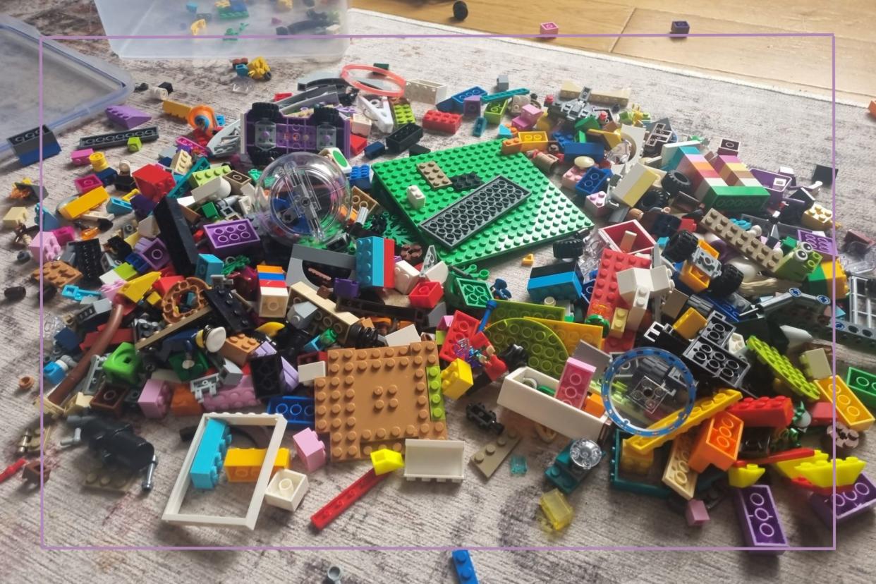  Why LEGO is good for children's development illustrated by pile of lego. 