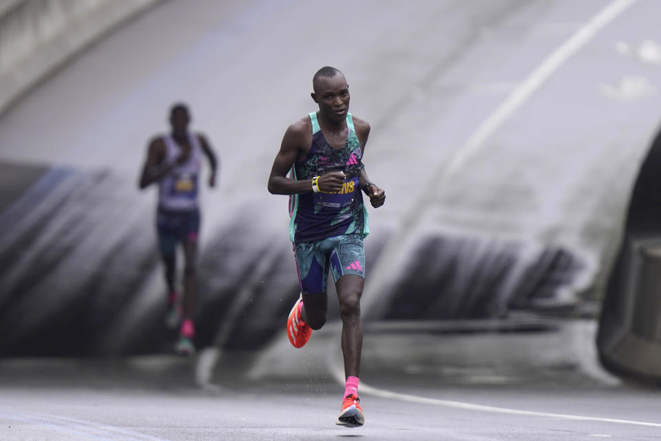 Evans Chebet, of Kenya, ahead of Gabriel Geay, of Tanzania, during the 127th Boston Marathon, Monday, April 17, 2023, in Boston. (AP Photo/Steven Senne)