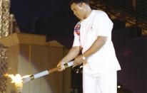 Lighting the Olympic torch at the 1996 Atlanta Games.