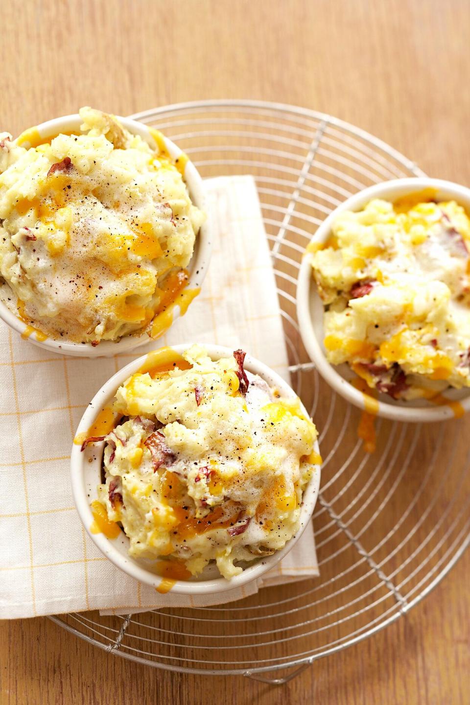 Yukon gold potatoes and oodles of cheese give these luscious potato casseroles rich flavor and color.