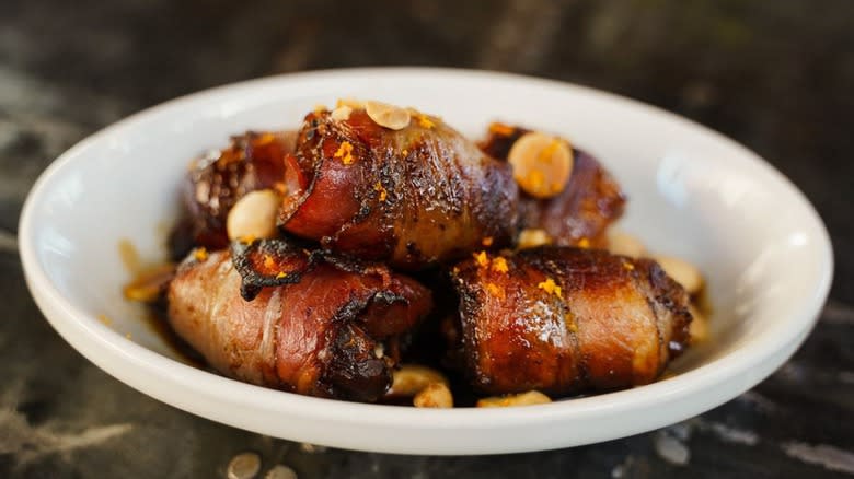 Bacon wrapped dates white plate