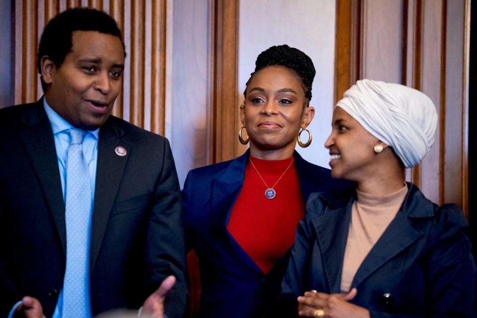 From left, Democratic Reps. Joe Neguse of Colorado, Shontel Brown of Ohio, and Ilhan Omar of Minnesota