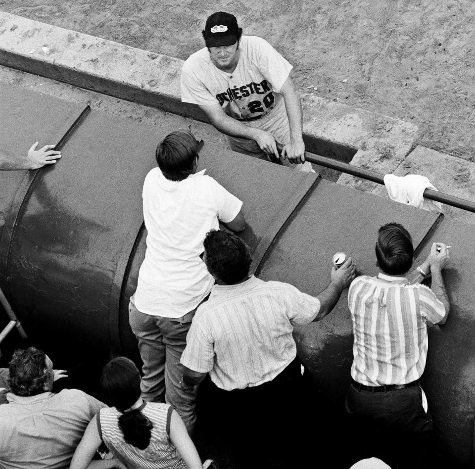 Rochester pitcher Bill Kirkpatrick visits with fans before game two of their opening round of playoffs against Syracuse, held in Syracuse Sept. 4, 1971. The Wings won the game 5-1. 