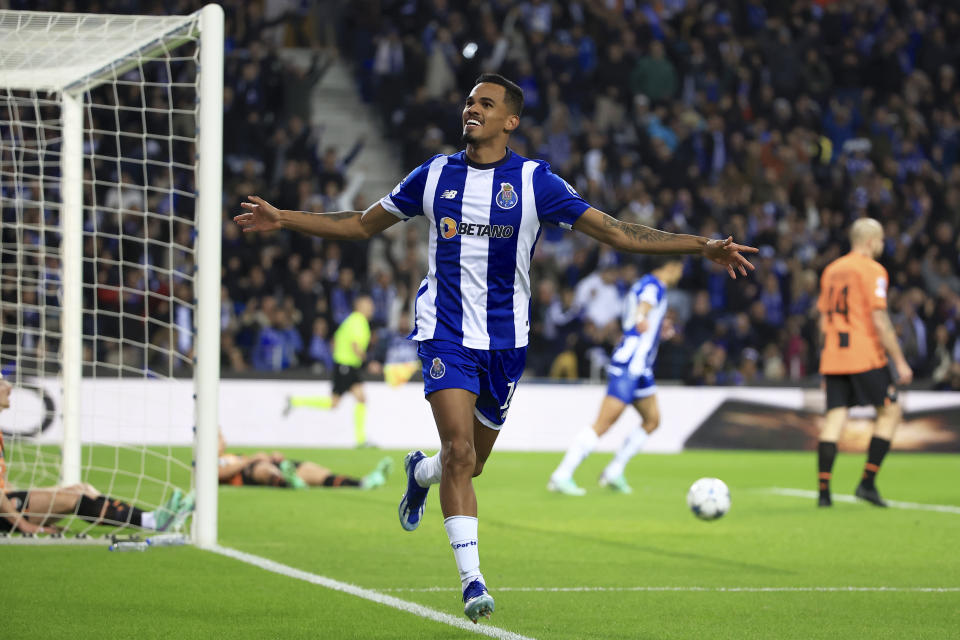 Porto's Galeno celebrates after scoring the opening goal during a Champions League group H soccer match between FC Porto and Shakhtar Donetsk at the Dragao stadium in Porto, Portugal, Wednesday, Dec. 13, 2023. (AP Photo/Luis Vieira)