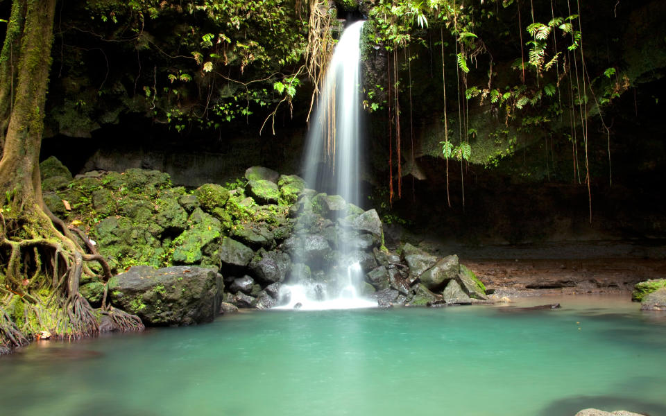 <p><strong>Why Go: </strong>Dominica (not to be confused with the Dominican Republic) is a secret oasis known as the nature island. It’s located halfway along the Eastern Caribbean archipelago and boasts tropical rainforests, rivers, waterfalls, and volcanoes. International flights from North America and Europe fly through Caribbean hubs like Barbados and Puerto Rico. A trip here is for the more adventurous traveler.</p> <p><strong>What to Do:</strong> Dominica is known for having some of the <a rel="nofollow noopener" href="http://www.dominica.dm/index.php/diving" target="_blank" data-ylk="slk:best diving;elm:context_link;itc:0;sec:content-canvas" class="link ">best diving</a> in the Caribbean, plus secret oases like the Emerald Pool, named for it’s lush green color, which is located in the middle of the rain forest. Four sea turtle species lay their eggs along Dominica’s shores, and although the mating and hatching season is over by December, it’s still possible to spot a huge leatherback taking a leisurely swim.</p> <p><strong>Where to stay:</strong> <a rel="nofollow noopener" href="http://rosaliebay.com/about.html" target="_blank" data-ylk="slk:Rosalie Bay;elm:context_link;itc:0;sec:content-canvas" class="link ">Rosalie Bay</a>, a family-owned eco resort built by hand over a nine-year period, sits 45 minutes from the capital city, Roseau. It’s hidden among the foothills of the Morne Trois Pitons on 22 acres right where the Atlantic Ocean and Rosalie River intersect. The resort’s restaurant, <a rel="nofollow noopener" href="http://rosaliebay.com/dining.html" target="_blank" data-ylk="slk:Zamaan;elm:context_link;itc:0;sec:content-canvas" class="link ">Zamaan</a>, serves dishes made with fresh ingredients from their garden. If you want to venture out, locals recommend <a rel="nofollow noopener" href="http://www.papillote.dm/restaurant/" target="_blank" data-ylk="slk:Papillote Rainforest Restaurant;elm:context_link;itc:0;sec:content-canvas" class="link ">Papillote Rainforest Restaurant</a>. It’s open to the public for lunch and dinner, set in the middle of the rainforest, and serves Creole-style island food. </p>