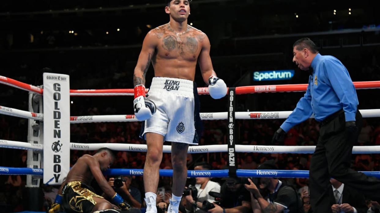 <div>LOS ANGELES, CA - JULY 16: Ryan Garcia walks away from Javier Fortuna after knocking him down in the third round at the Crypto.com Arena on July 16, 2022 in Los Angeles, United States. (Photo by John McCoy/Getty Images)</div>