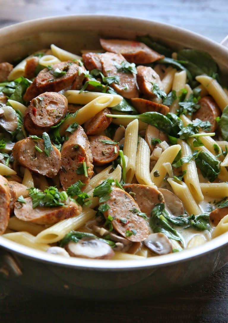 <p>Creamy, garlicky pasta is what dreams are made of. This recipe calls for chicken sausage (Heck and Richmond do get varieties), but opt for pork sausages if you prefer. If using pork sausages, make sure they're cooked properly (around 10-12min in the pan). </p><p>Get the <a href="https://www.delish.com/uk/cooking/recipes/a29571352/chicken-sausage-and-mushroom-penne-recipe/" rel="nofollow noopener" target="_blank" data-ylk="slk:Sausage and Mushroom Penne;elm:context_link;itc:0;sec:content-canvas" class="link ">Sausage and Mushroom Penne</a> recipe.</p>