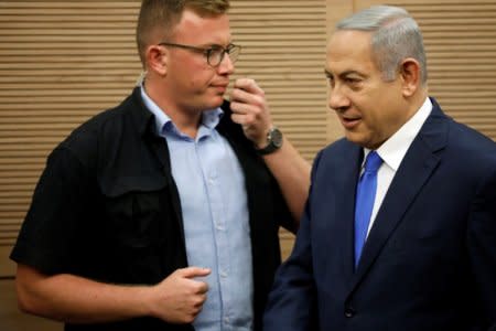 Israeli Prime Minister Benjamin Netanyahu arrives to attend the Foreign Affairs and Defense Committee at the Knesset, Israel's Parliament, in Jerusalem November 19, 2018. REUTERS/Amir Cohen