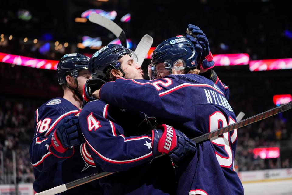 Mar 4, 2024; Columbus, Ohio, USA; Columbus Blue Jackets left wing Alexander Nylander (92) gets a kiss from center Cole Sillinger (4) after scoring during the third period of the NHL hockey game against the Vegas Golden Knights at Nationwide Arena. The Blue Jackets won 6-3.