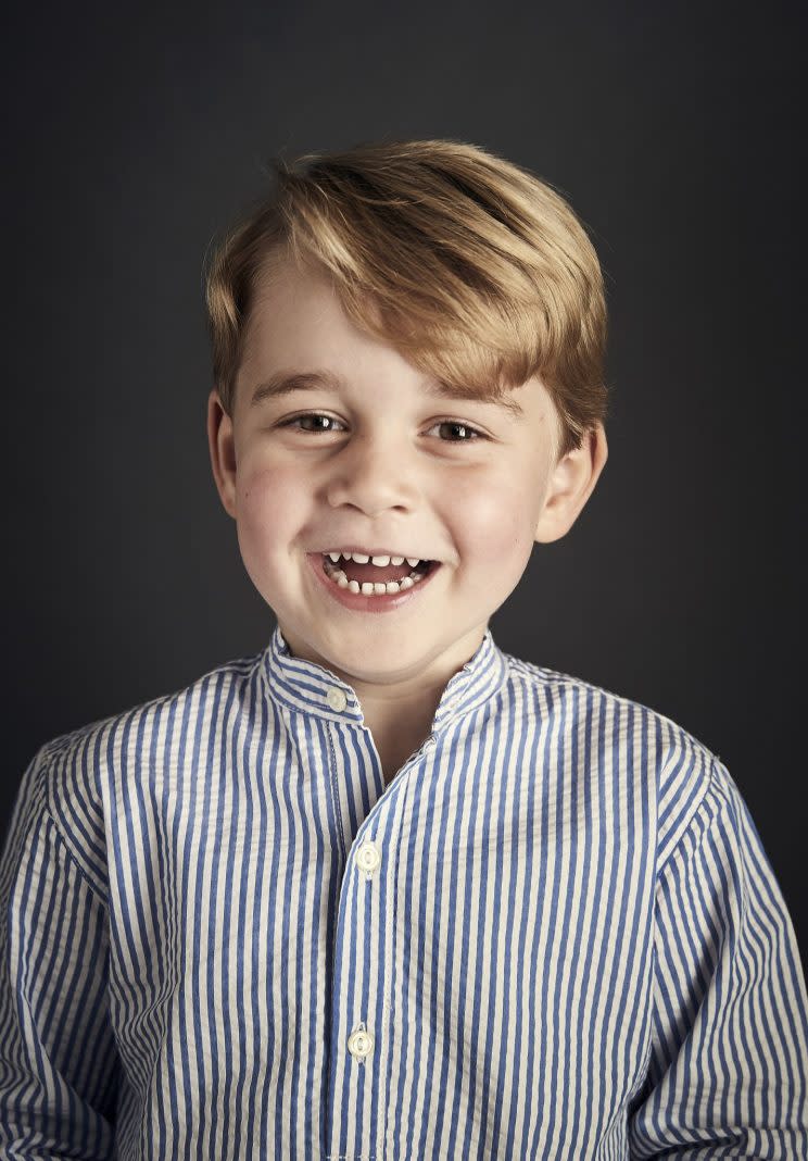 Prince George is grinning in his official fourth birthday portrait [Photo: PA]