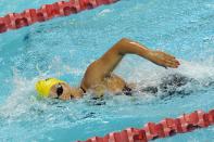 Blair Evans swims in the women's 400-meter freestyle finals during the FINA World Cup short-course swim in Singapore on Nov. 5, 2011. Evans won the gold medal. (ROSLAN RAHMAN/AFP/Getty Images)